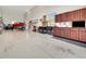 Large garage with plenty of storage, work space, and room for a boat at 4716 Heritage Trl, Leesburg, FL 34748
