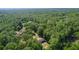 An expansive forest canopy surrounds this property, creating a secluded and private atmosphere for this wooded residential neighborhood at 5581 Sw 197Th Ter, Dunnellon, FL 34431