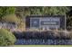 Rainbow Springs State Park sign at headsprings entrance with lush vegetation and rock borders at 5581 Sw 197Th Ter, Dunnellon, FL 34431