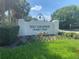 Community sign reading Rio Grande Gathering Pool at 612 Lisbon Ln, The Villages, FL 32159
