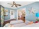 Bright sunroom with comfortable seating and views of the backyard and kitchen at 612 Lisbon Ln, The Villages, FL 32159
