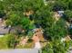 Beautiful single-Gathering home with mature trees, attractive landscaping, and a brick path leading to the front entrance at 640 Sailfish Rd, Winter Springs, FL 32708