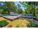 Backyard of a property, featuring flat roofing, in a peaceful setting at 640 Sailfish Rd, Winter Springs, FL 32708