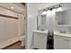 Well-lit bathroom featuring tiled shower and double vanity at 640 Sailfish Rd, Winter Springs, FL 32708