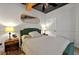 Cozy bedroom featuring unique ceiling, soft lighting, and classic decor at 640 Sailfish Rd, Winter Springs, FL 32708