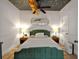 Charming bedroom featuring a unique ceiling and soft, ambient lighting at 640 Sailfish Rd, Winter Springs, FL 32708