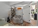 Relaxing bedroom with comfortable chair and shelves at 640 Sailfish Rd, Winter Springs, FL 32708