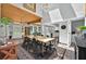 Open dining room with views to front entryway and kitchen with breakfast bar at 640 Sailfish Rd, Winter Springs, FL 32708