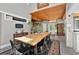 Dining room showcasing high ceilings, wooden accents, and a large wooden table at 640 Sailfish Rd, Winter Springs, FL 32708