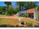 Beautiful home features terracotta colored roof and interesting landscaping at 640 Sailfish Rd, Winter Springs, FL 32708