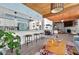 Open living space with kitchen, dining, and living areas under beautiful wooden ceilings at 640 Sailfish Rd, Winter Springs, FL 32708