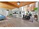 Open-concept living space with wood ceiling, seamless transition between living, dining, and kitchen areas at 640 Sailfish Rd, Winter Springs, FL 32708