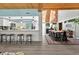 Bright, open floor plan connecting the kitchen, dining area, and living spaces under a striking wood ceiling at 640 Sailfish Rd, Winter Springs, FL 32708