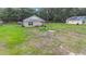 Backyard featuring green grass and a shed at 6710 Winkles St, Coleman, FL 33521