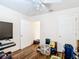 Bedroom featuring hardwood floors and an open door at 6710 Winkles St, Coleman, FL 33521