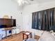 Cozy living area features hardwood floors, and is perfect for relaxation and entertainment at 6710 Winkles St, Coleman, FL 33521