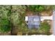 Aerial view of property showing home, yard, and defined property lines at 705 Poinsettia Ave, Fruitland Park, FL 34731