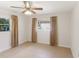 Comfortable bedroom with tile flooring and natural light at 7378 Ne 49Th Ln, Wildwood, FL 34785