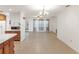 Spacious dining room with a view of the living area at 7378 Ne 49Th Ln, Wildwood, FL 34785