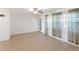 Bright living room featuring tile flooring, and a ceiling fan at 7378 Ne 49Th Ln, Wildwood, FL 34785