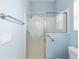 Shower stall with decorative glass door in the bathroom at 762 Turbeville Ter, The Villages, FL 32162