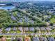 Aerial view of the property showcasing a well-maintained neighborhood with lush green trees and landscaping at 812 Eagle Claw Ct, Lake Mary, FL 32746