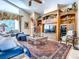 Comfortable living room with custom wood built-ins, a large TV, and plush seating at 812 Eagle Claw Ct, Lake Mary, FL 32746