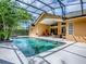 A screened-in pool with an outdoor seating area is the ideal location for entertaining or simply enjoying the day at 812 Eagle Claw Ct, Lake Mary, FL 32746