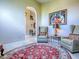 Inviting sitting room features elegant chairs, stylish decor, and a decorative rug at 812 Eagle Claw Ct, Lake Mary, FL 32746