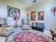 Elegant sitting room with decorative rug, stylish seating, and neutral paint at 812 Eagle Claw Ct, Lake Mary, FL 32746