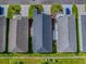Aerial view of property with large lot, great lawn and landscape outlined in red in suburban setting at 865 Conroe St, The Villages, FL 34762