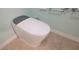 Bathroom featuring a modern, high-tech toilet with sleek design on tile floor at 8980 Se 176Th Limerick Ln, The Villages, FL 32162