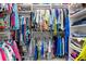 Spacious walk-in closet with ample storage space for clothing and shoes, complete with built-in shelving at 8980 Se 176Th Limerick Ln, The Villages, FL 32162