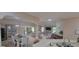 Spacious living space combining living, dining and kitchen areas at 8980 Se 176Th Limerick Ln, The Villages, FL 32162