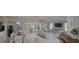 Spacious open floorplan with dining area, living room, and kitchen at 8980 Se 176Th Limerick Ln, The Villages, FL 32162