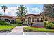 Elegant clubhouse with beautiful architecture and well-manicured landscaping at 9307 San Jose Blvd, Howey In The Hills, FL 34737