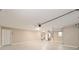 Spacious two car garage featuring epoxy flooring at 997 Nash Loop, The Villages, FL 32162