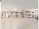Spacious two car garage featuring epoxy flooring at 997 Nash Loop, The Villages, FL 32162