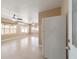 Spacious living room with ceiling fans and tile floors at 997 Nash Loop, The Villages, FL 32162