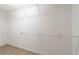Walk-in closet with shelving and a rod for hanging clothes at 997 Nash Loop, The Villages, FL 32162