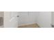 Walk-in closet with tiled floor and hanging rod at 997 Nash Loop, The Villages, FL 32162
