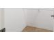 Walk-in closet with tiled floor and hanging rod at 997 Nash Loop, The Villages, FL 32162