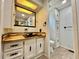 The updated bathroom boasts a custom countertop, matte black hardware, and a bright, inviting atmosphere at 105 Temple W Cv, Leesburg, FL 34748