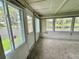 Cozy Florida room with scenic views of the lake at 105 Temple W Cv, Leesburg, FL 34748