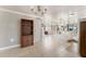 Open floor plan with kitchen, dining, and living areas for easy entertaining and everyday living at 1113 Elkhart Cir, Tavares, FL 32778