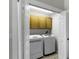 Conveniently located laundry room with modern washer and dryer at 12838 Owasso Ln, Clermont, FL 34711