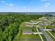 Aerial view outlining property in a desirable neighborhood, near the lake and green spaces at 12952 Del Lago Dr, Astatula, FL 34705