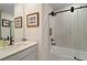 Modern bathroom with a glass-enclosed shower, vanity, and stylish fixtures at 12952 Del Lago Dr, Astatula, FL 34705