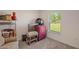 Bedroom interior showcasing lots of room, neutral colors, and ample natural light at 12952 Del Lago Dr, Astatula, FL 34705