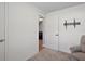 Bedroom featuring a door, chair and a TV wall mount at 12952 Del Lago Dr, Astatula, FL 34705